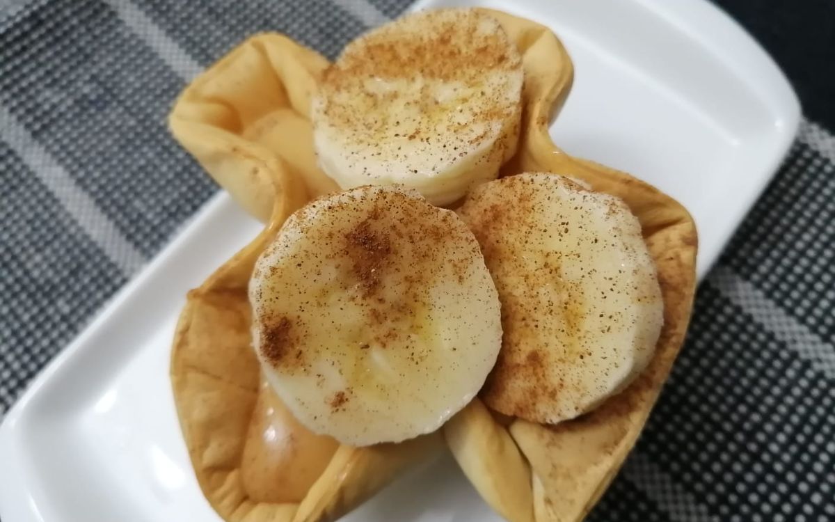 Receita de Tortinha de Banana com Massa de <a class="wpil_keyword_link" href="https://casalairfryer.com/receitas/pastel-na-airfryer/"   title="Pastel" data-wpil-keyword-link="linked">Pastel</a> na Airfryer